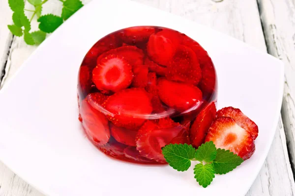 Jelly strawberry with mint on board — Stock Photo, Image