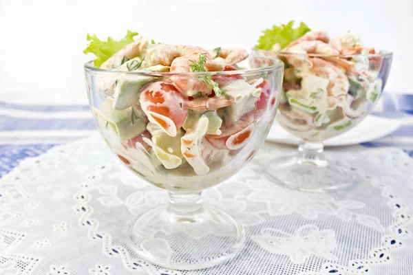 Salad with shrimp and avocado in glass on white napkin — Stock Photo, Image