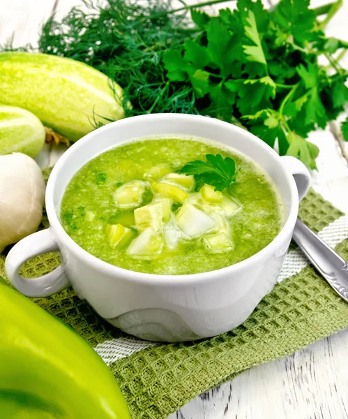 Soup cucumber with garlic in white bowl on board — Stock Photo, Image