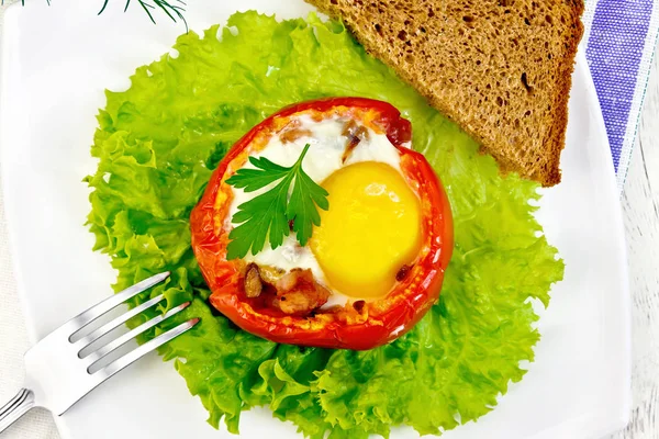 Scrambled eggs in tomato on light board top — Stock Photo, Image