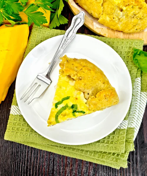 Pie of pumpkin and cheese in plate on board top — Stock Photo, Image