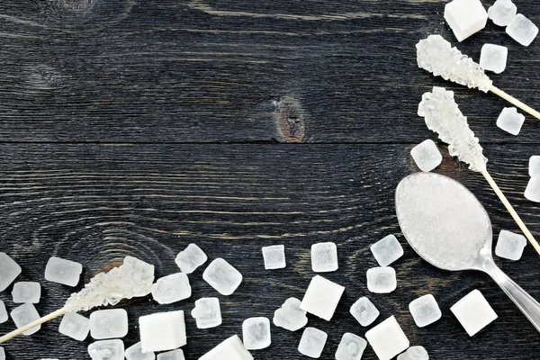 Açúcar branco na moldura da placa preta — Fotografia de Stock