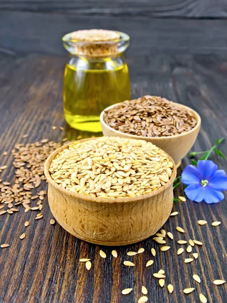 Flaxen white and brown seed in bowl with oil on board — Stock Photo, Image