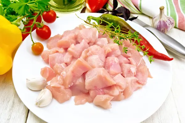 Chicken breast raw sliced in plate on board — Stock Photo, Image