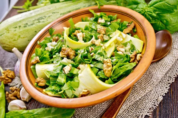 Salad with squash and sorrel on board — Stock Photo, Image