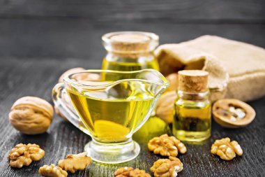 Oil walnut in sauceboat on board