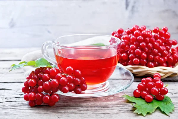 Tea Viburnum Glass Cup Green Leaves Wicker Plate Berries Burlap — Stock Photo, Image