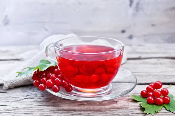 Tea Viburnum Glass Cup Berries Green Leaves Burlap Wooden Board — Stock Photo, Image