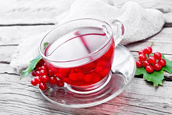 Tea Viburnum Glass Cup Berries Green Leaves Burlap Napkin Background — Stock Photo, Image