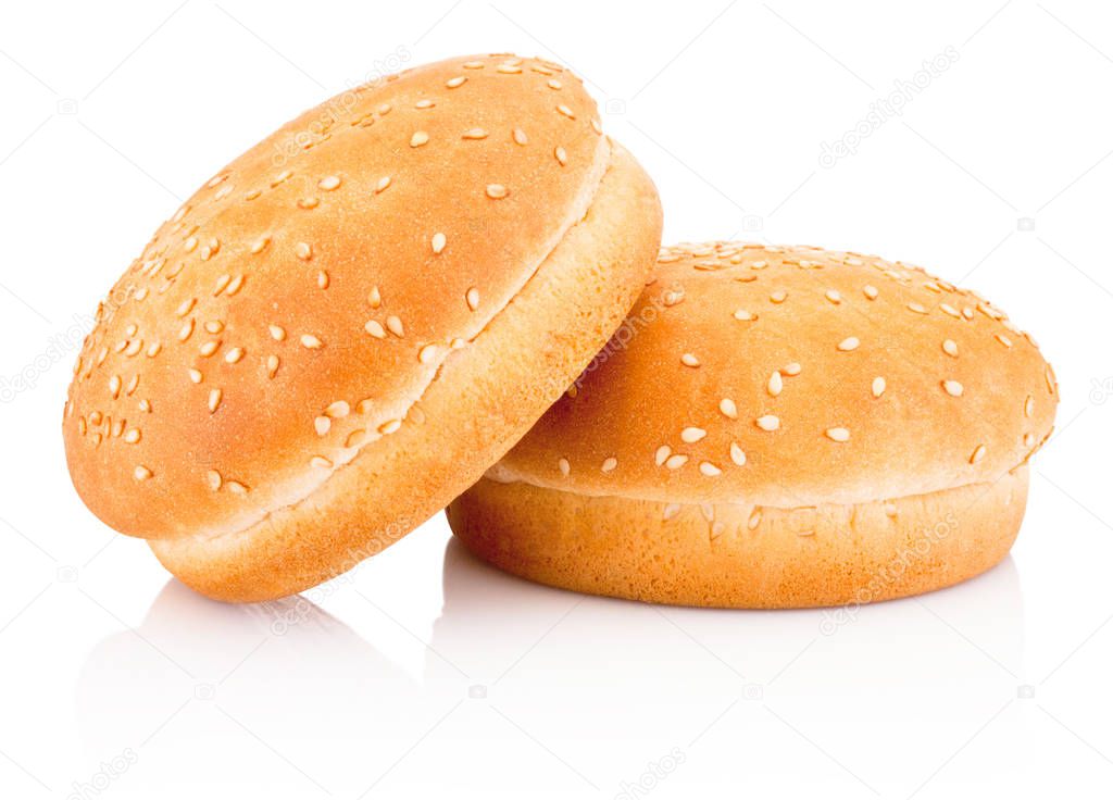 Two hamburger buns with sesame isolated on white background