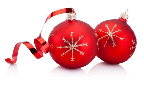 Two red Christmas decoration bauble and curling paper Isolated — Stock Photo, Image
