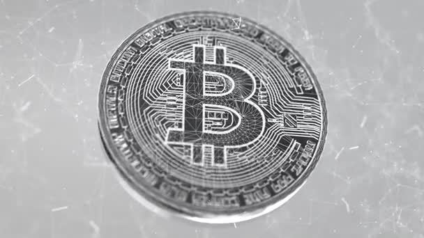 Mengelilingi bitcoin pada abu-abu — Stok Video