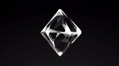 Siyah arka plan üzerine düzenli octahedron döndürme 