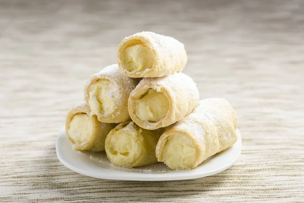 Cannoli stuffed with ricotta cream — Stock Photo, Image