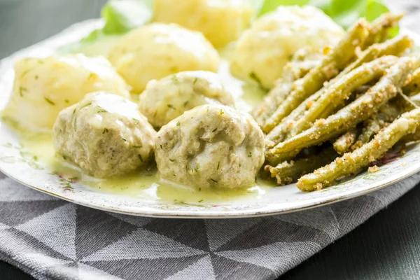 Meatballs in dill sauce — Stock Photo, Image