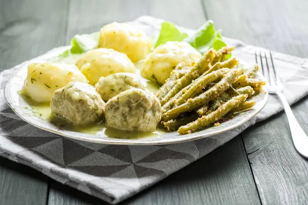 Meatballs in dill sauce — Stock Photo, Image