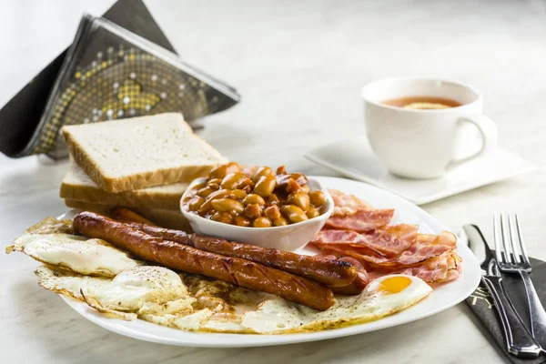 English breakfast only with a cup of tea — Stock Photo, Image