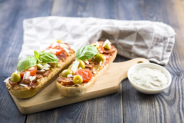 Mini pizza and casseroles — Stock Photo, Image