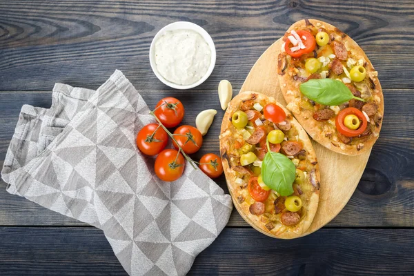 Mini pizza and casseroles — Stock Photo, Image