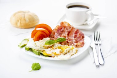 bacon and eggs with avocado and tomato, bread and coffee clipart