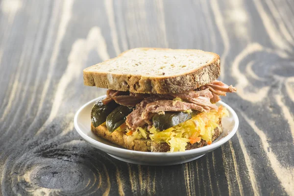 Sandwich with pulled pork and sauerkraut — Stock Photo, Image