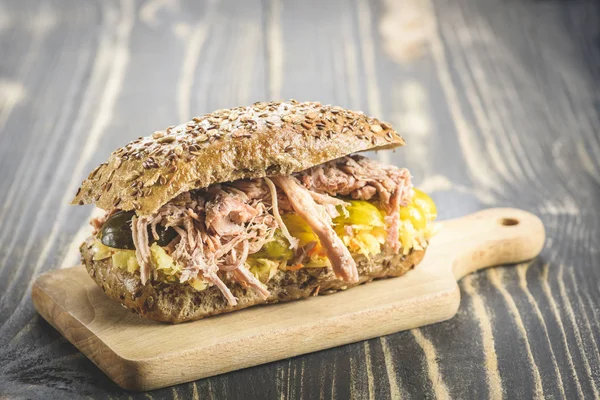 Sandwich with pulled pork and sauerkraut — Stock Photo, Image