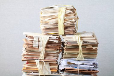 A pack of old office papers for recycling of waste paper clipart