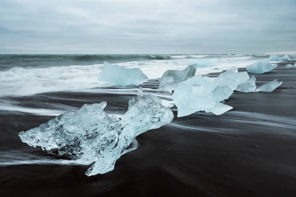 Ice on the beach with black sand in Iceland — Stock Photo, Image