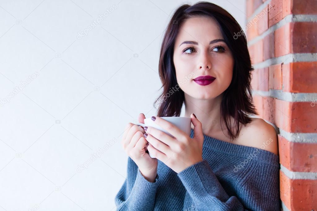  woman with of coffee or tea
