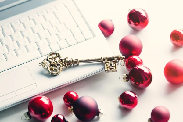 Laptop and christmas decorations — Stock Photo, Image