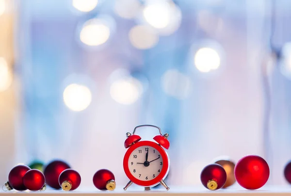 Christmas alarm clock with baubles — Stock Photo, Image