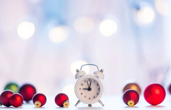 Christmas alarm clock with baubles — Stock Photo, Image