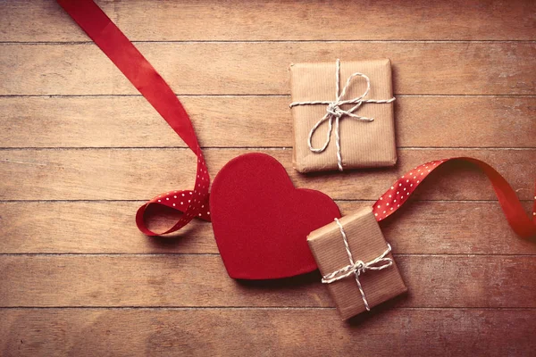 Gifts, toy and ribbon — Stock Photo, Image