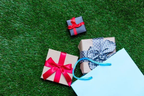 Shopping bag and gifts — Stock Photo, Image