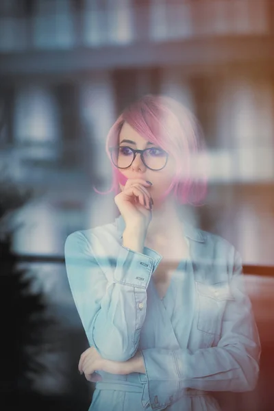 Young woman in reflection — Stock Photo, Image