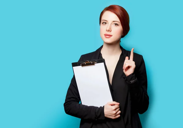 Beautiful young woman with clipboard — Stock Photo, Image