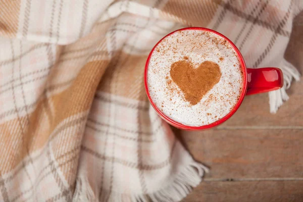 Cup of coffee and tablecloth — Stock Photo, Image