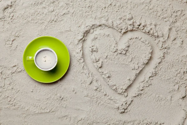 Heart shaped drawing and cup of coffee — Stock Photo, Image