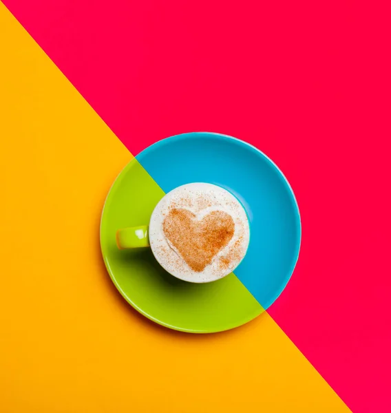 Cup of coffee on the  colorful background — Stock Photo, Image