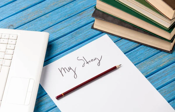 Laptop and paper with My Story words — Stock Photo, Image