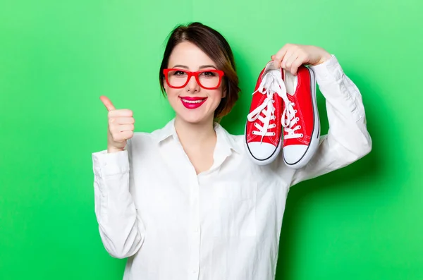 Young woman with shoes — Stock Photo, Image