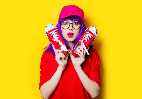 Woman with red gumshoes — Stock Photo, Image