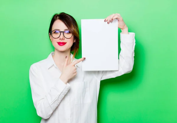 Young woman with blank sheet — Stock Photo, Image