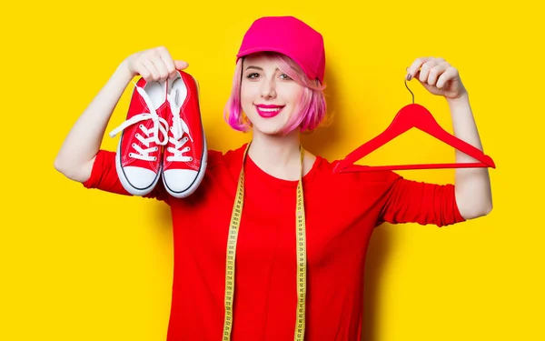 Woman with red gumshoes — Stock Photo, Image