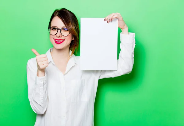 Young woman with blank sheet — Stock Photo, Image