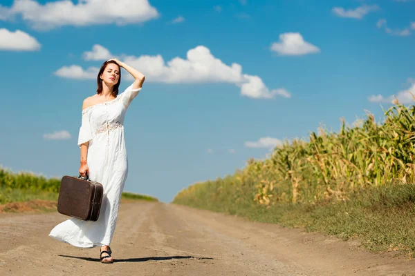 Woman standing on road — Stock Photo, Image