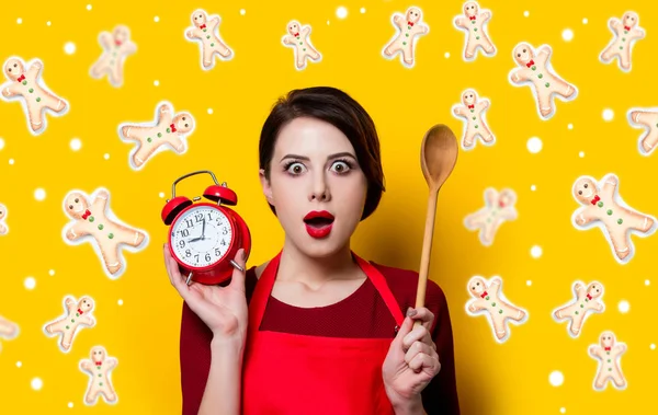 Woman with spoon and alarm clock — Stock Photo, Image