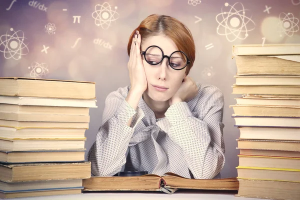 The young teacher in glasses with books. — Stock Photo, Image