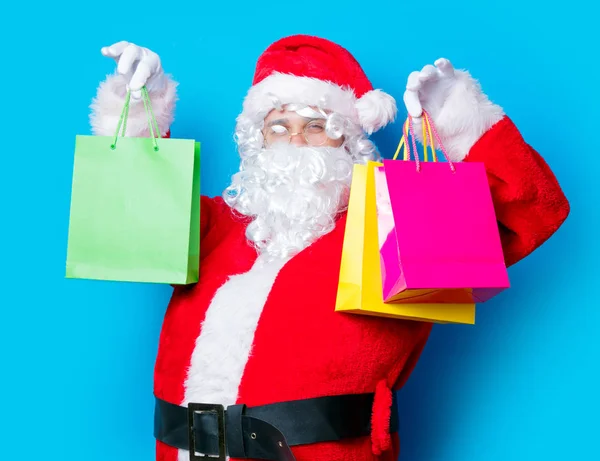Santa Claus have a fun with shopping bags — Stock Photo, Image