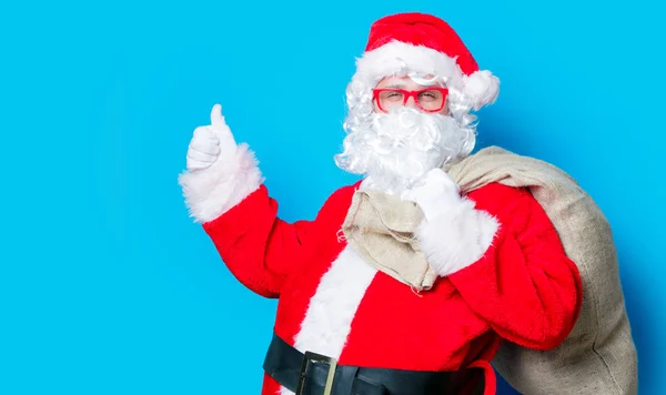 Funny Santa Claus have a fun with red eyeglasses — Stock Photo, Image